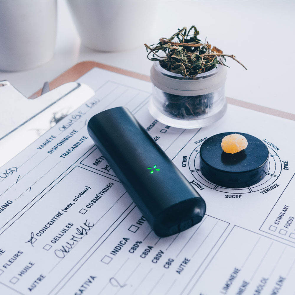 A vape pen on a sheet of paper