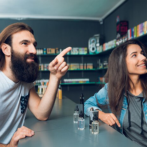Man pointing to something in vape shop