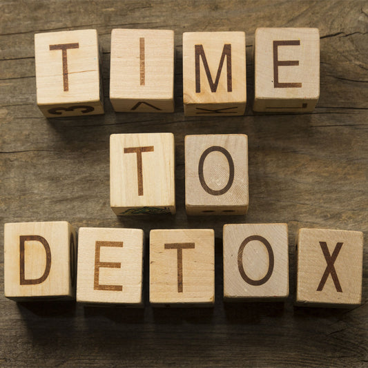 Paper boxes spelling out Time To Detox