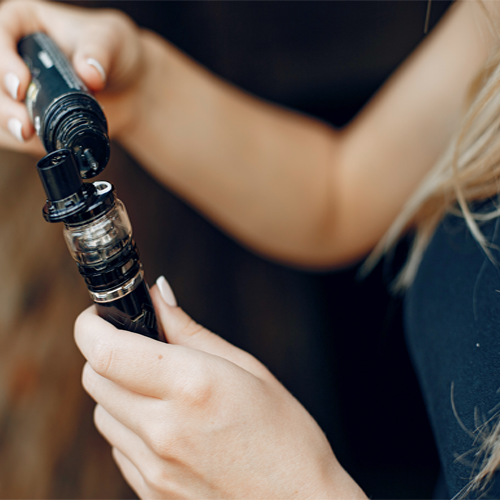 Girl filling her vape